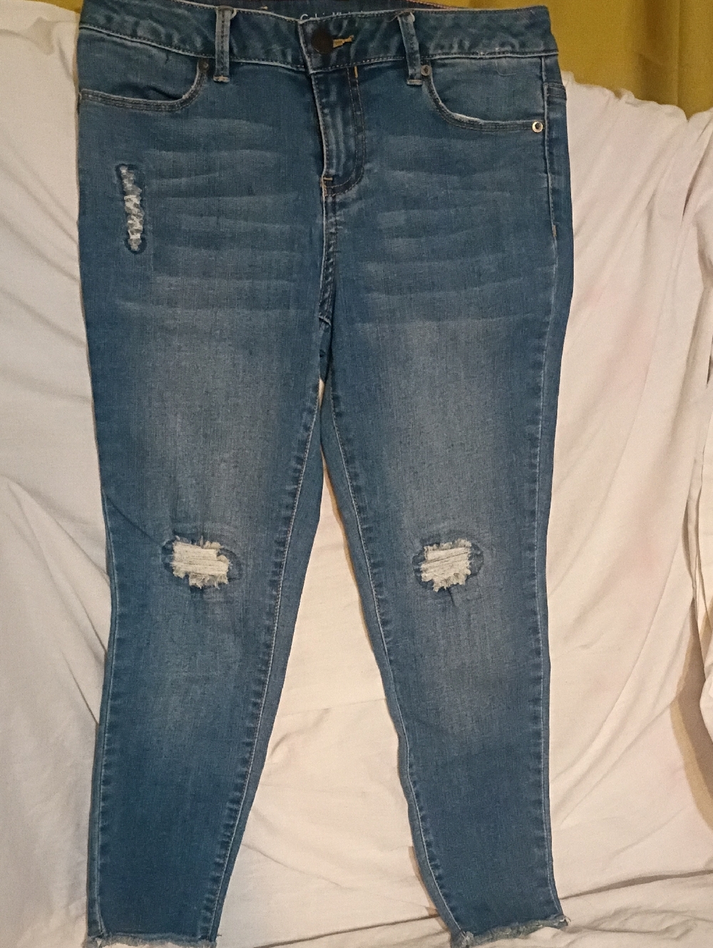 Calvin Klein Distressed Skinny Jeans in Medium Blue